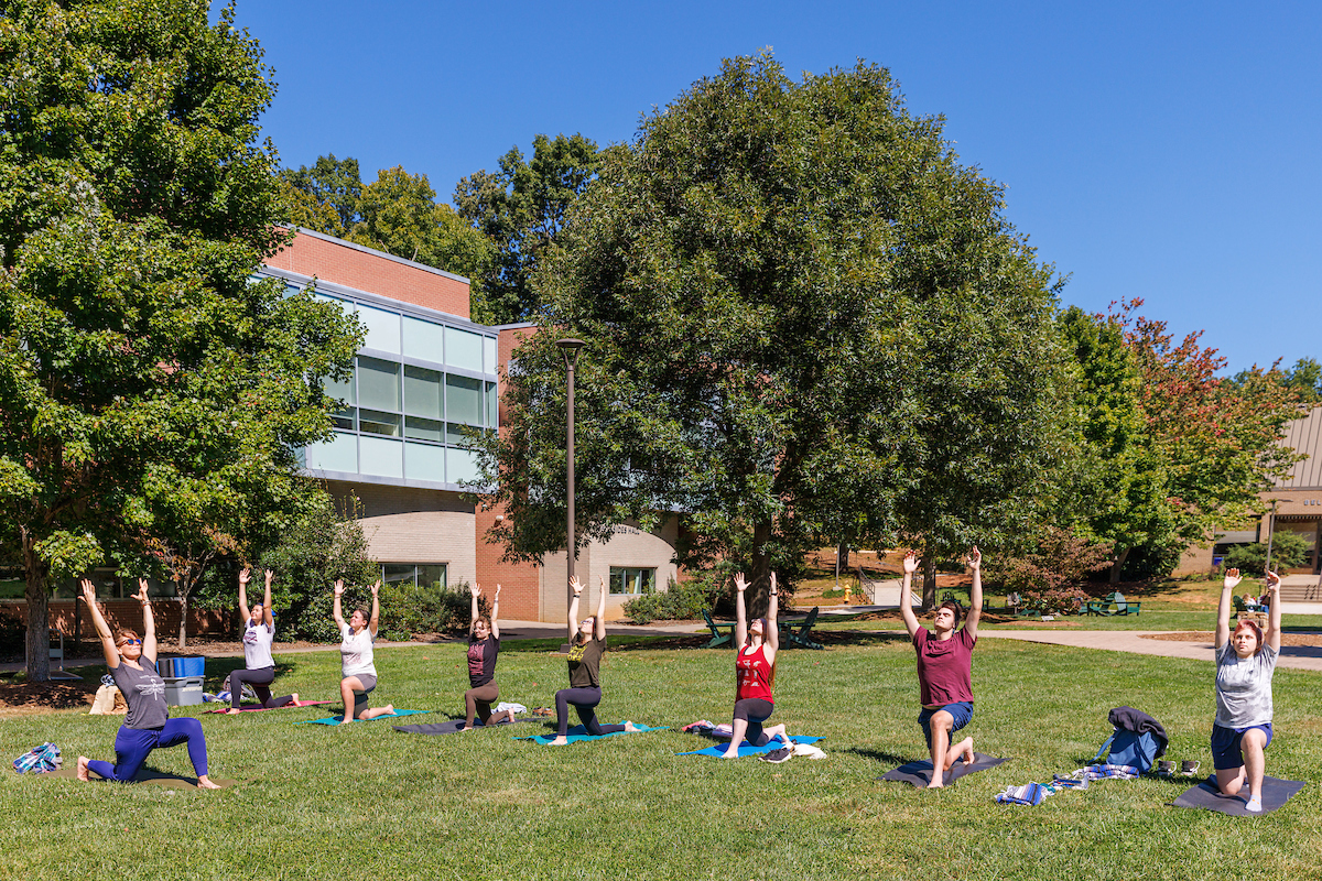 UNC Asheville students outdoor yoga exercise