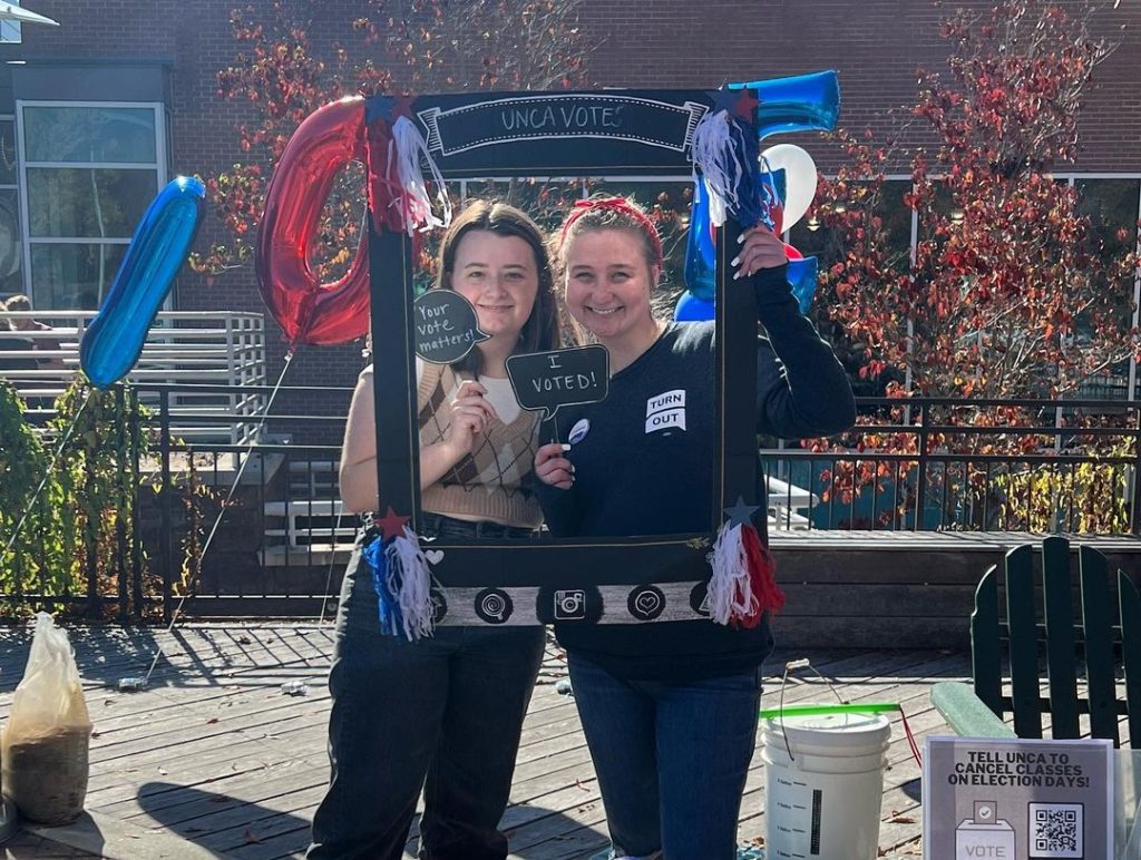 Two students at a unca votes event