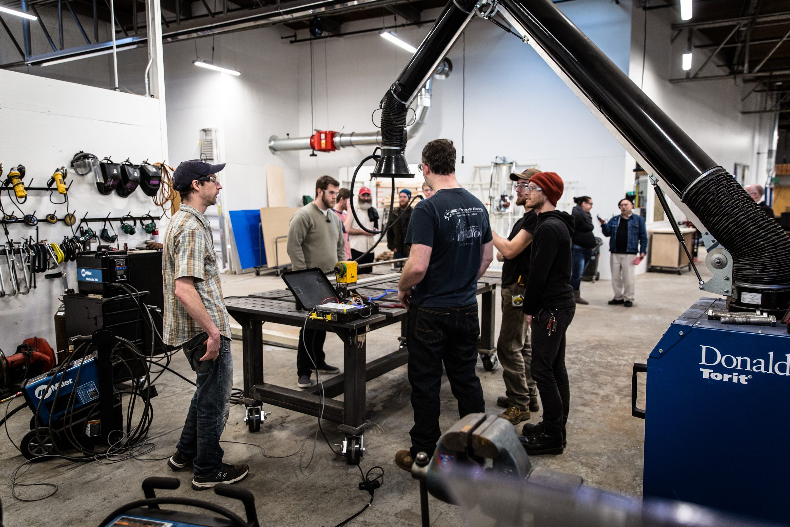 A group of engineering students working in the STEAM studio