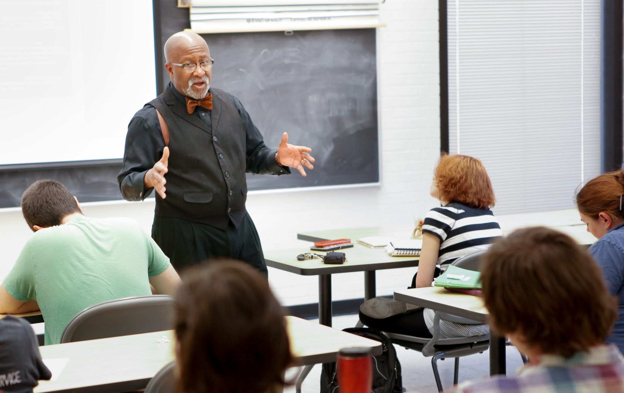 political science professor Dwight Mullen lecturing a class