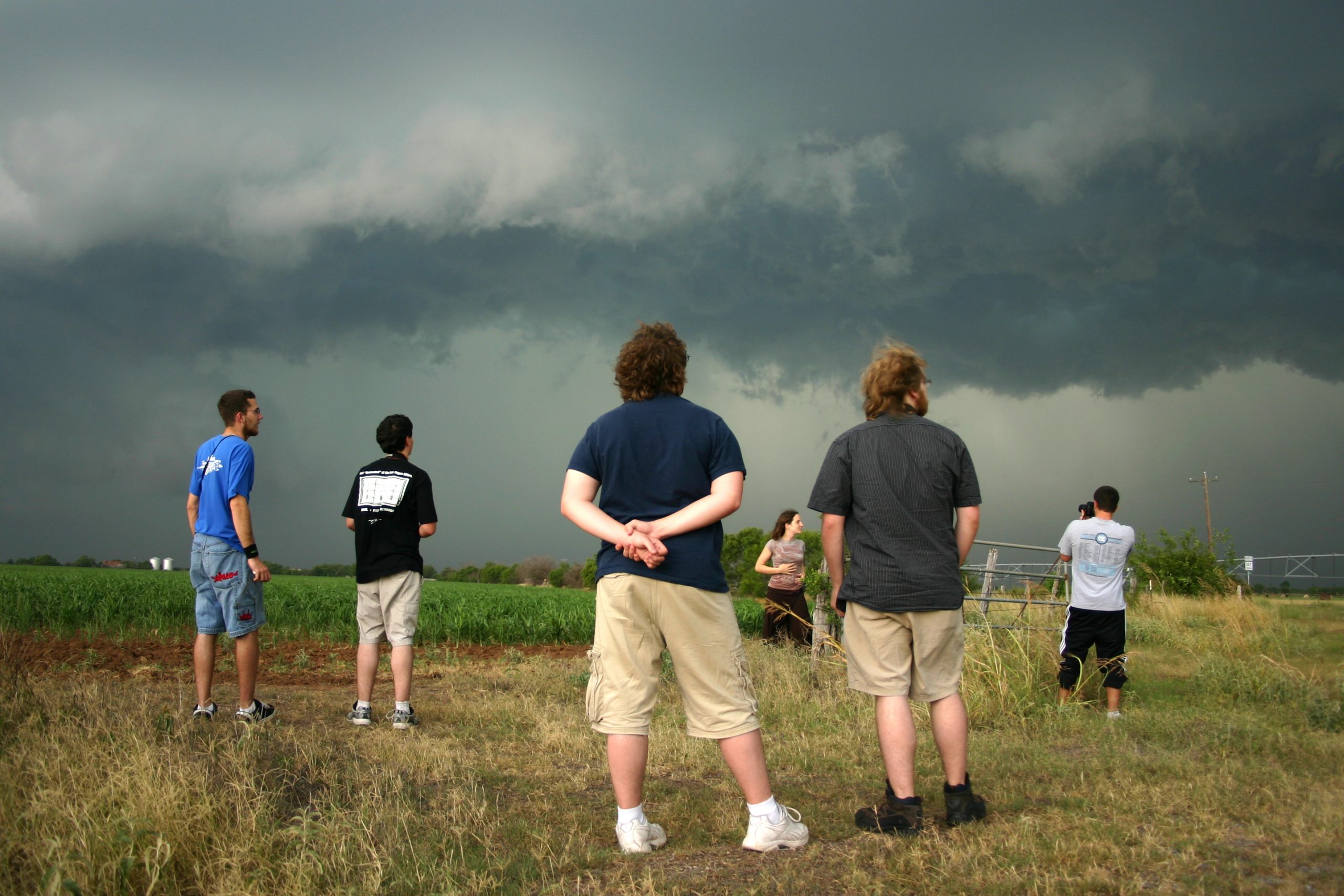 Atmospheric science students studying a storm