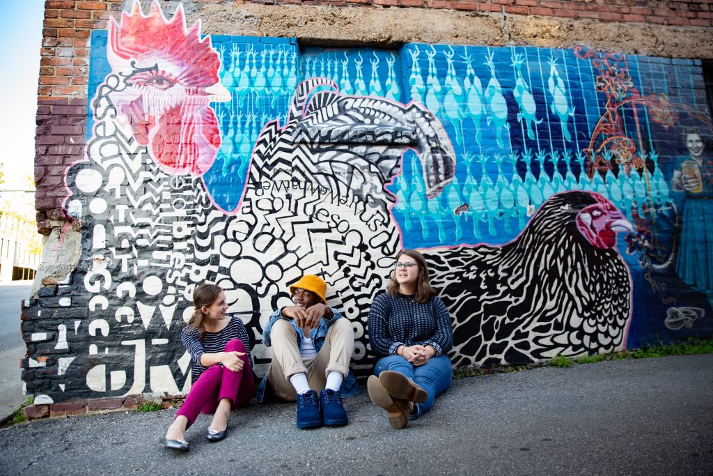 Three students downtown at chicken alley