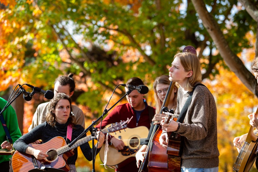 students playing live music at turning of the maples