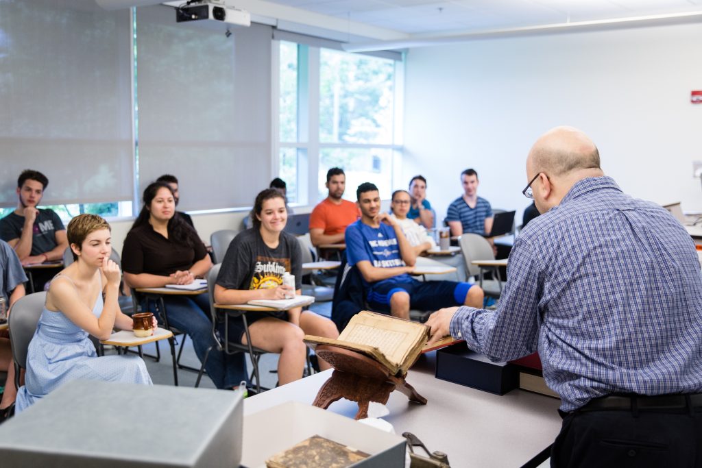 A professor teaching an ams class