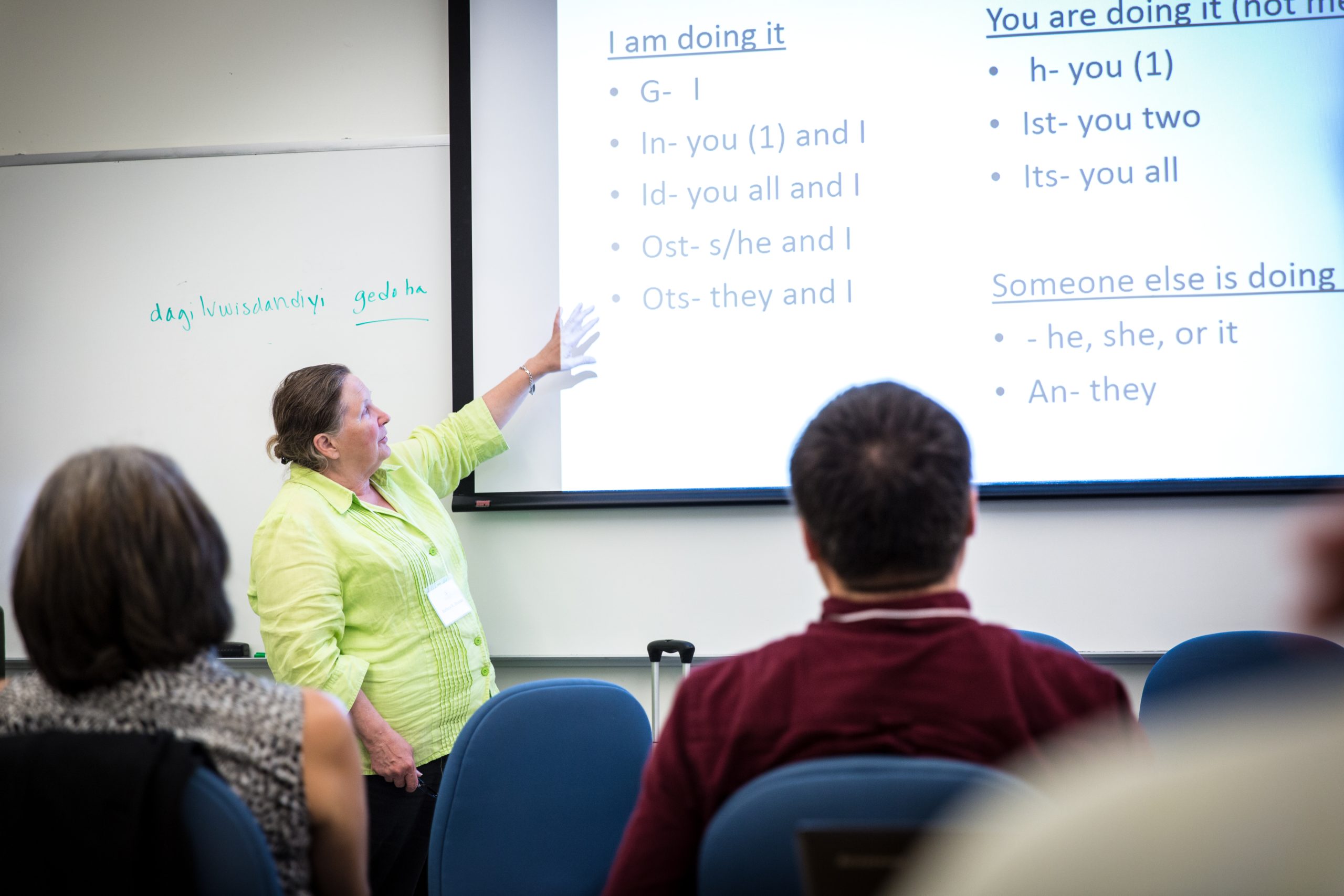 a professor teaching a Cherokee language class