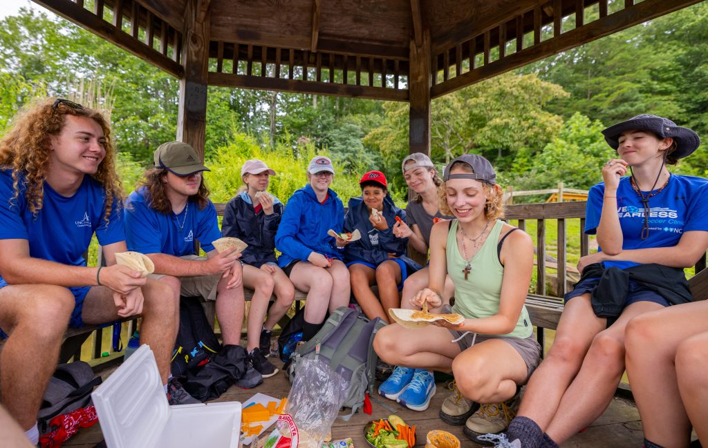 Outdoor Program Embark - students gathered under a gazebo at DuPont National Forest Fawn Lake & Falls