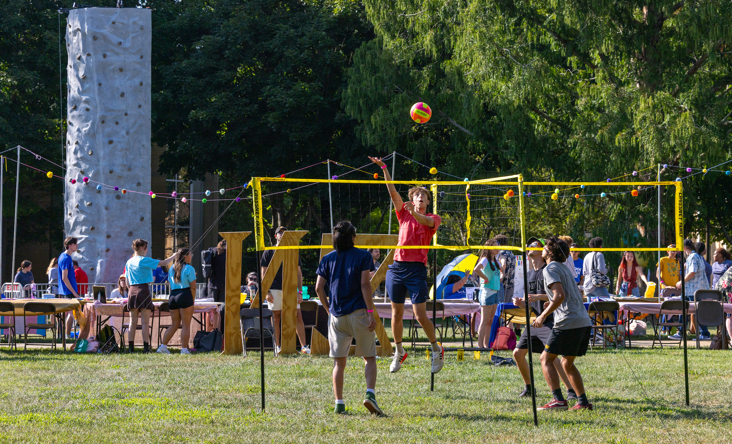 Students playing volleyball at rockypalooza