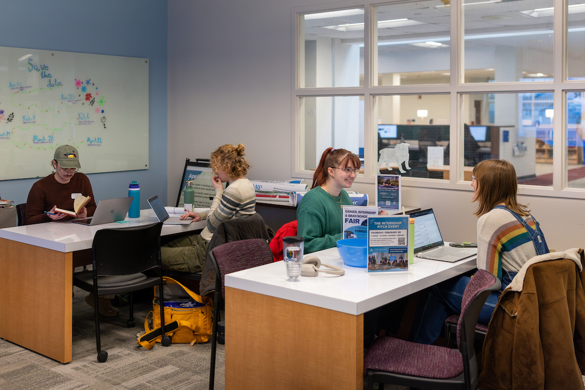 photo of students studying in the library